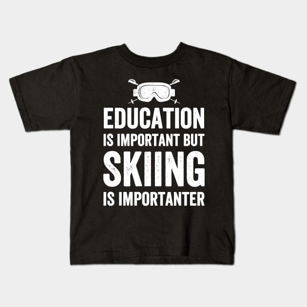 Education is important but skiing is importanter Kids T-Shirt by captainmood